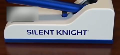 A nurse using the Silent Knight in a hospital medication room